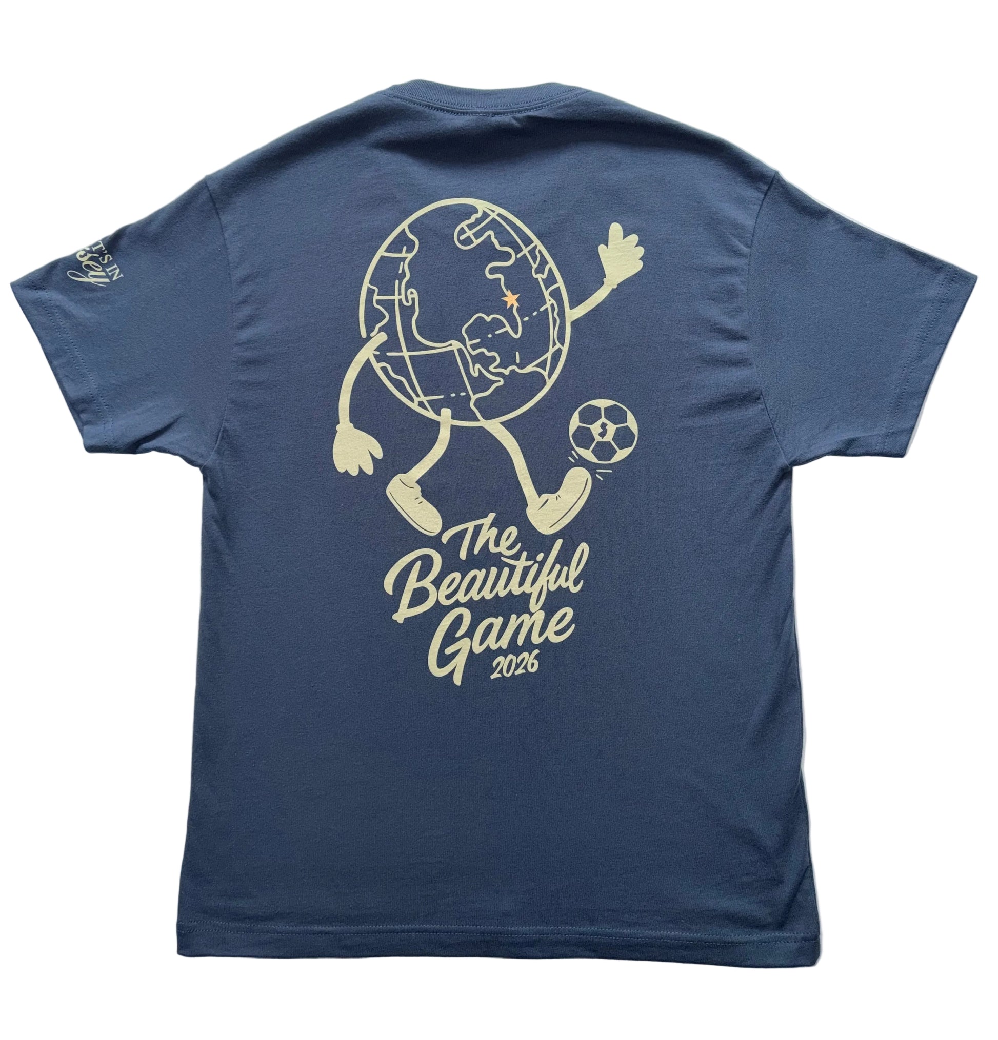 Vintage Navy t-shirt with a large globe mid kick graphic with 'The Beautiful Game 2026' text on the back