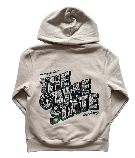 Beige hoodie with black Greetings from The Game State graphic. Jersey icons sketch details within